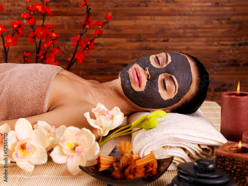 Photo: Adult woman relaxing in spa salon Adult woman relaxing in spa salon