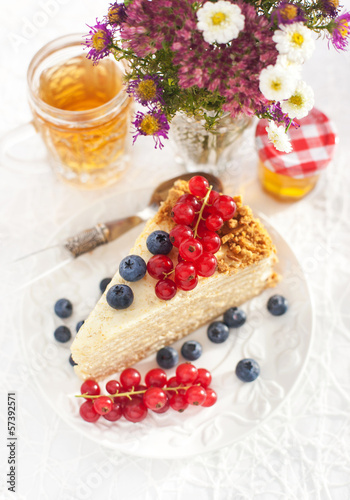 Photo: Piece of homemade honey cake with fresh berries Piece of homemade honey cake with fresh berries