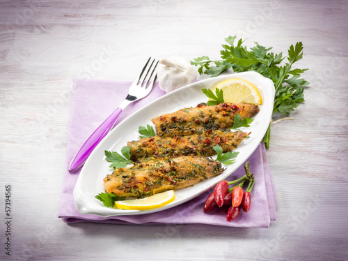 Photo: fish fillet with hot chili pepper and parsley fish fillet with hot chili pepper and parsley