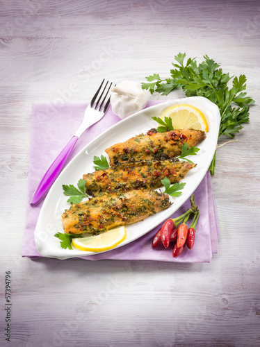 Photo: fish fillet with hot chili pepper and parsley fish fillet with hot chili pepper and parsley