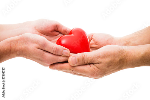 Photo: Heart in the human hands Heart in the human hands