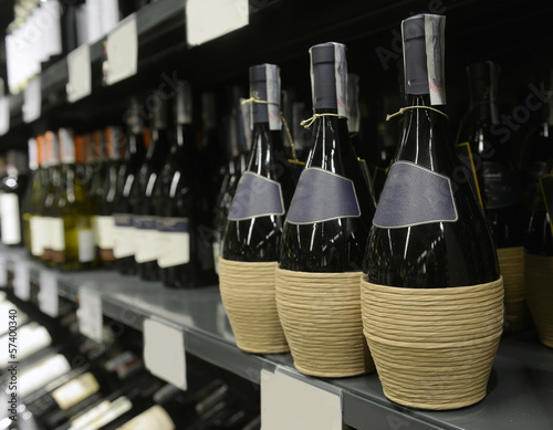 Photo: Red and white wine in bottles Red and white wine in bottles