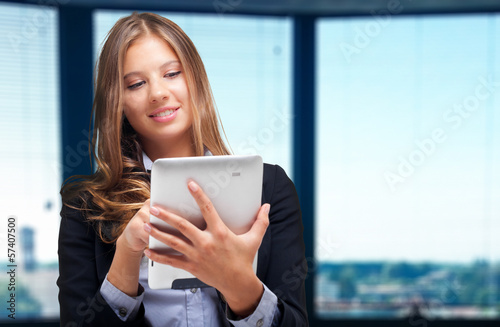Photo: Businesswoman using a tablet Businesswoman using a tablet