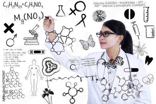 Photo: Scientist writes formula Scientist writes formula