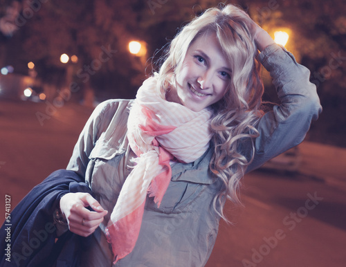 Photo: Portrait of a young female businesswoman in night Portrait of a young female businesswoman in night