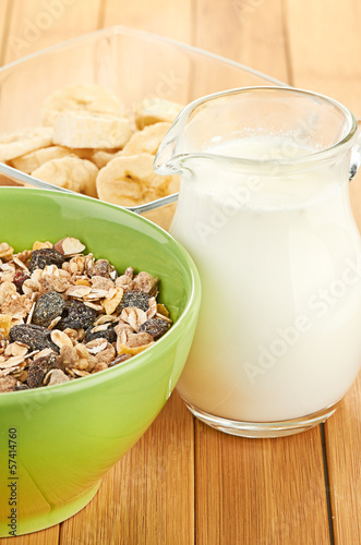 Photo: Delicious and healthy cereal in bowl with milk Delicious and healthy cereal in bowl with milk