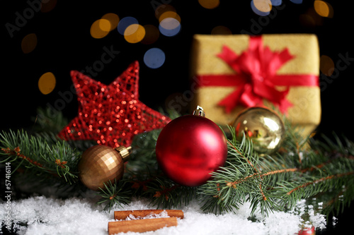 Photo: Beautiful Christmas composition on table on bright background Beautiful Christmas composition on table on bright background