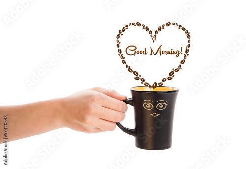 Photo: Coffee mug with coffee beans shaped heart with good morning sign Coffee mug with coffee beans shaped heart with good morning sign