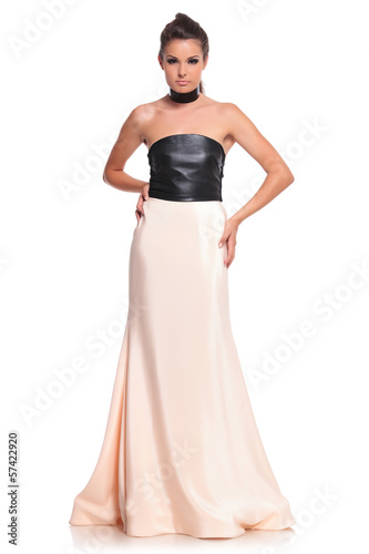 Photo: attractive brunette in a long dress attractive brunette in a long dress