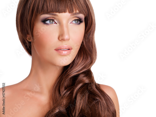 Photo: Profile portrait of beautiful woman with long red hairs Profile portrait of beautiful woman with long red hairs