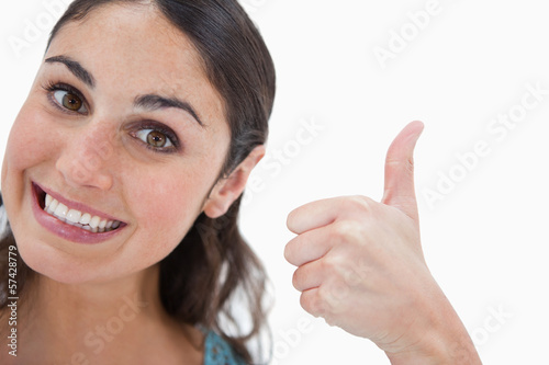 Photo: Woman with the thumb up Woman with the thumb up