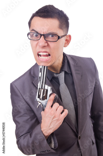 Photo: Funny businessman with gun on white Funny businessman with gun on white
