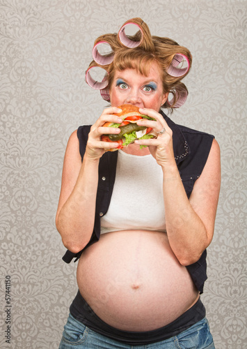 Photo: Hungry Pregant Woman Eating Hungry Pregant Woman Eating
