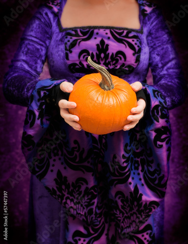Photo: Holding Pumpkin Holding Pumpkin