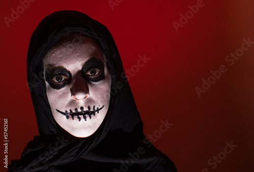 Photo: scary skull woman red background scary skull woman red background