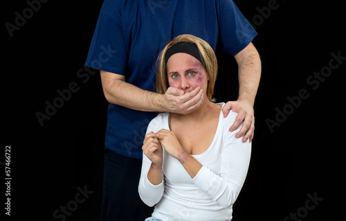 Photo: woman with bruises victim of violence woman with bruises victim of violence