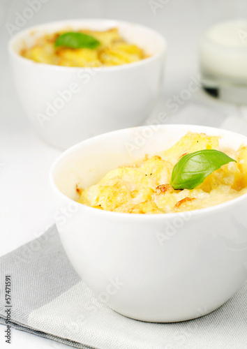 Photo: Potato gratin in the white bowl Potato gratin in the white bowl