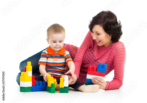 Photo: kid boy playing toys together mother kid boy playing toys together mother