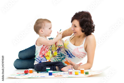 Photo: mother wih kid boy drawing and painting together mother wih kid boy drawing and painting together