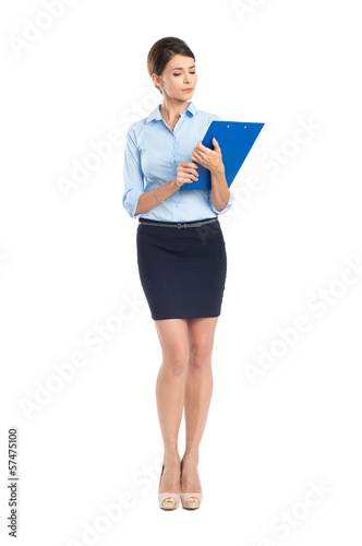 Photo: Young Businesswoman Holding Clipboard Young Businesswoman Holding Clipboard