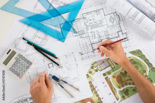 Photo: Architect With Blueprints Architect With Blueprints