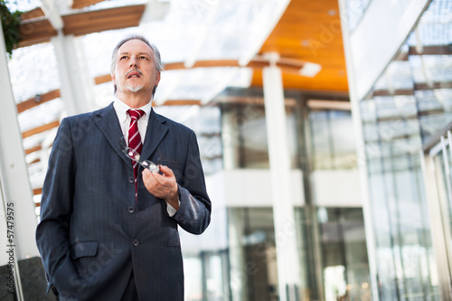 Photo: Confident businessman portrait Confident businessman portrait