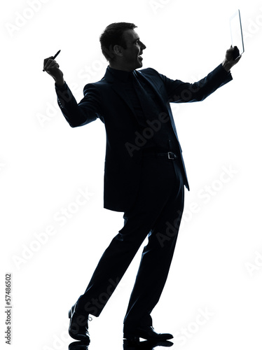 Photo: business man digital pen stylus tablet silhouette business man digital pen stylus tablet silhouette