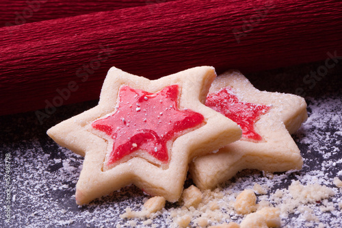 Photo: christmas star cookies with red jelly and powder sugar christmas star cookies with red jelly and powder sugar
