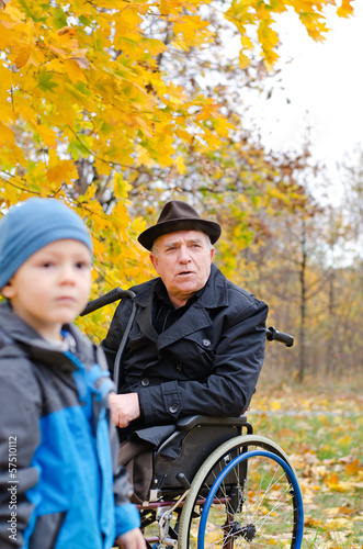 Photo: Disabled grandfather and grandchild Disabled grandfather and grandchild