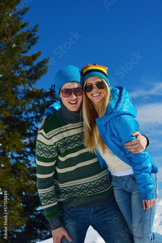 Photo: Young Couple In Winter Snow Scene Young Couple In Winter Snow Scene