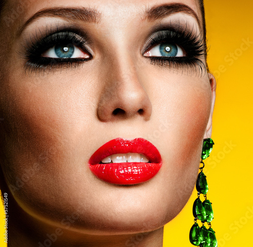 Photo: Portrait of beautiful woman model with professional makeup Portrait of beautiful woman model with professional makeup