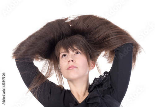 Photo: Attractive young woman with lovely long hair Attractive young woman with lovely long hair