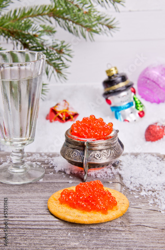 Photo: Red caviar on a cracker Red caviar on a cracker