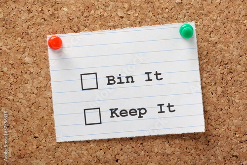Photo: Bin It or Keep It Tick boxes on a cork notice board Bin It or Keep It Tick boxes on a cork notice board