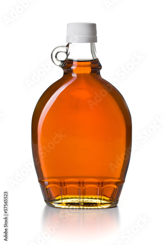Photo: maple syrup in glass bottle maple syrup in glass bottle