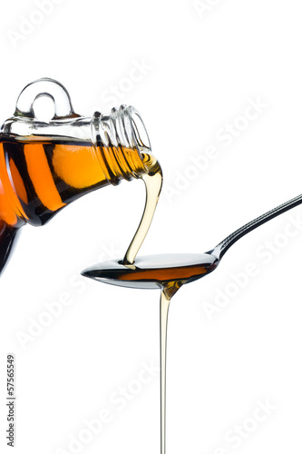 Photo: maple syrup pourin on spoon maple syrup pourin on spoon