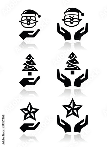 Vector: Hands with christmas icons - santa claus, tree, star Hands with christmas icons - santa claus, tree, star
