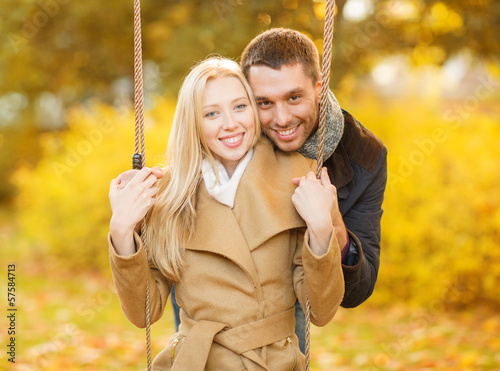 Photo: romantic couple in the autumn park romantic couple in the autumn park