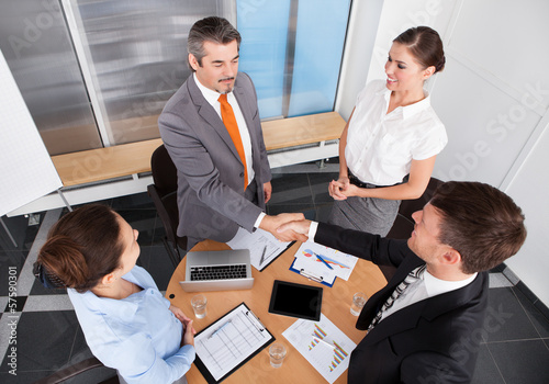 Photo: Businesspeople Shaking Hands Businesspeople Shaking Hands