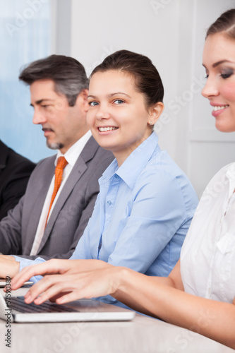 Photo: Businesspeople Using Laptop Businesspeople Using Laptop