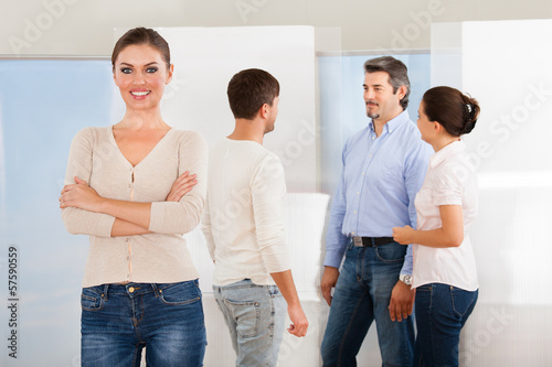 Photo: Young Woman With Group Of People Young Woman With Group Of People