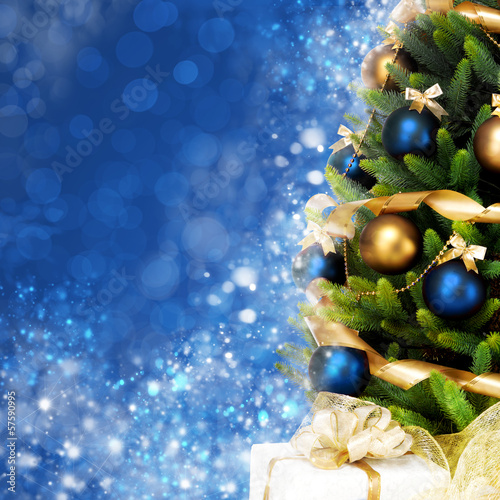 Photo: Magically decorated Christmas Tree with balls, ribbons and garla Magically decorated Christmas Tree with balls, ribbons and garla