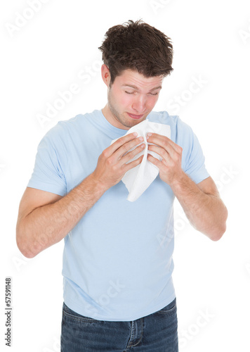 Photo: Young Man Blowing His Nose Young Man Blowing His Nose