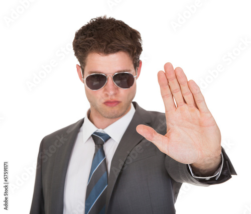 Photo: Young Businessman Showing His Hand Young Businessman Showing His Hand