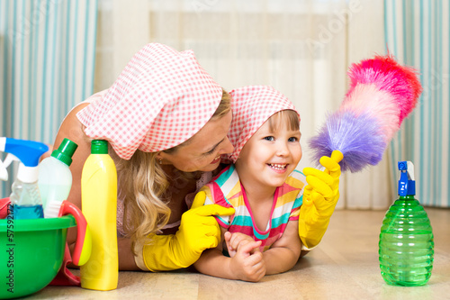 Photo: mother and her child ready to room cleaning mother and her child ready to room cleaning