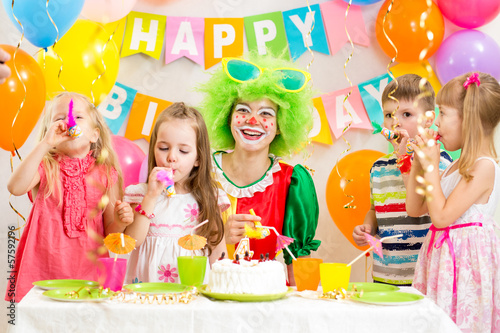Photo: children and clown at birthday party children and clown at birthday party