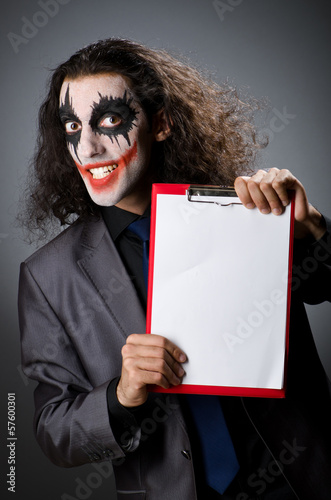 Photo: Funny Joker with paper binder Funny Joker with paper binder