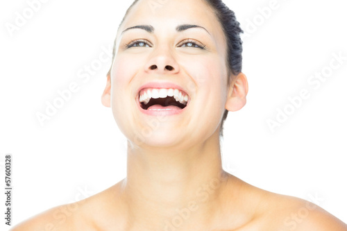 Photo: Front view of pretty woman laughing Front view of pretty woman laughing