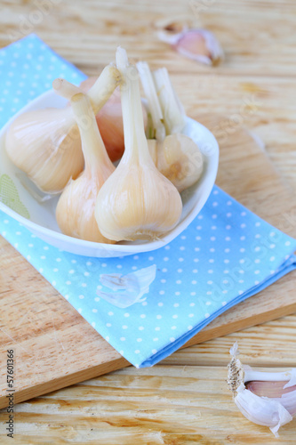 Photo: pickled garlic in a bowl on the table pickled garlic in a bowl on the table