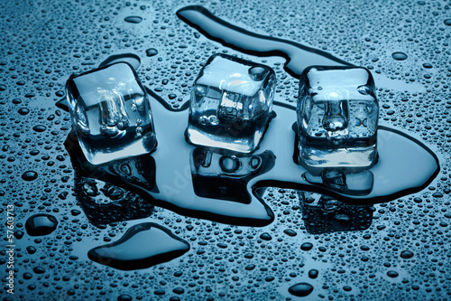 Photo: Ice cubes over dark background Ice cubes over dark background